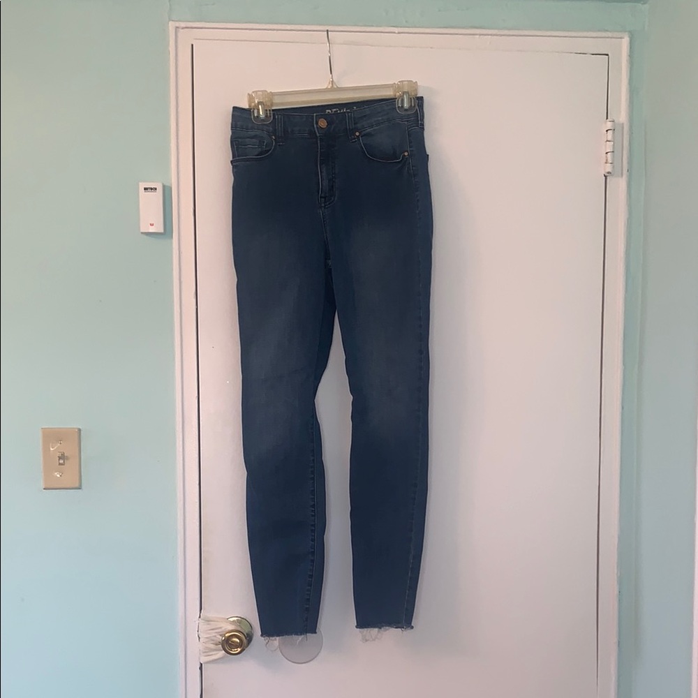 Women's Blue Jeans with frayed bottoms